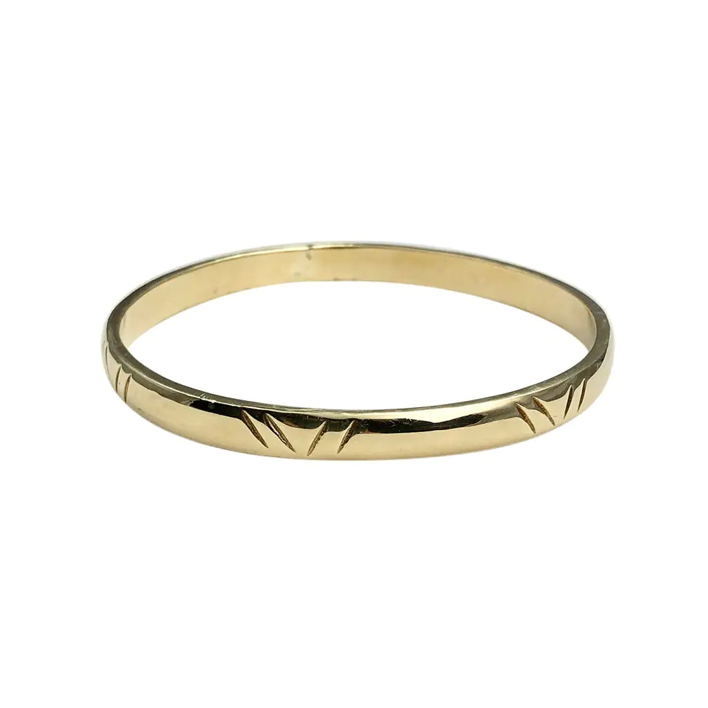 Carved Bombshell Brass Bangle